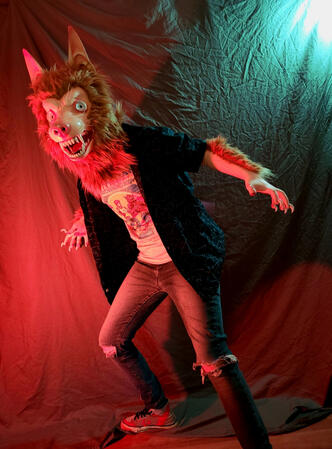 Full body photo of Ragsy's Michigan Dogman cosplay.